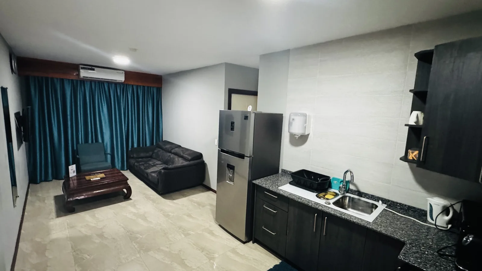 Kitchen and living area in the King apartment